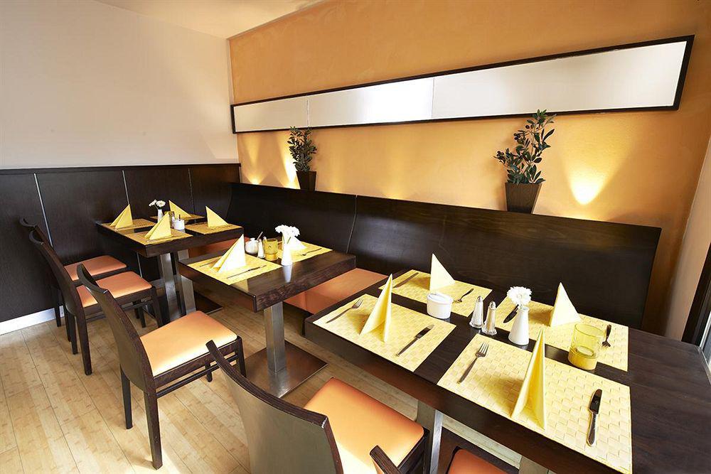 GHOTEL hotel&living München-City Restaurante foto